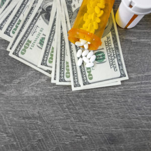 money and prescription drugs