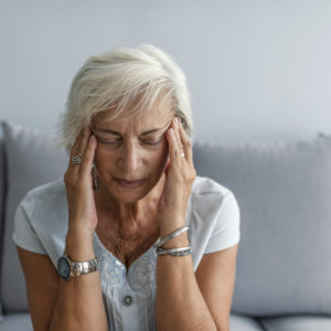 woman having migraine