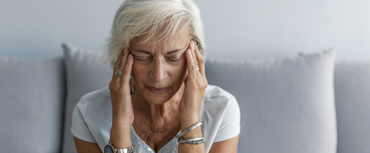 woman having migraine