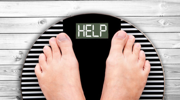 help written on weight scale