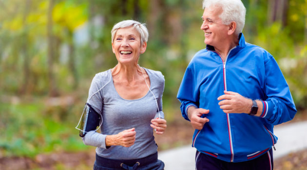 smiling couple jogging