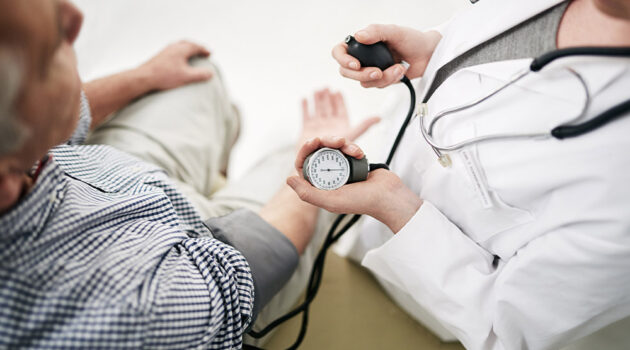 Doctor examining patient.