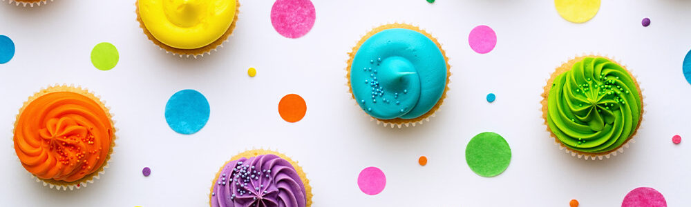 colorful cupcakes next to each other.