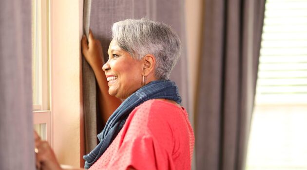 Woman looking out the window.