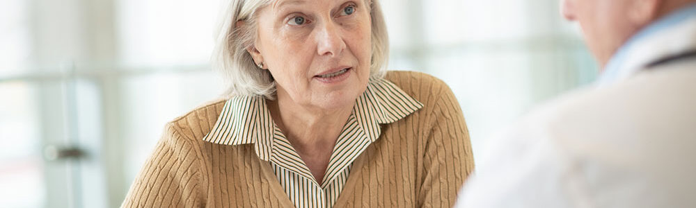 patient talking with doctor.