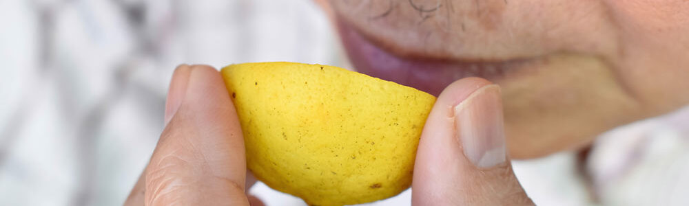 Man smells lemon to test his heart health